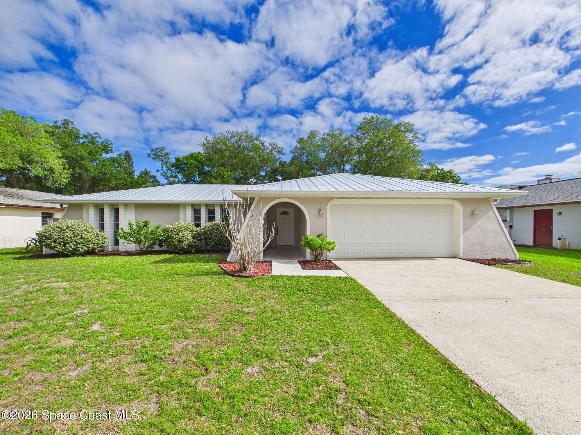 1523 Breese Street Northeast Palm Bay, FL 32905 - Photo 1 of 38 1523-breese-st-palm-bay-01