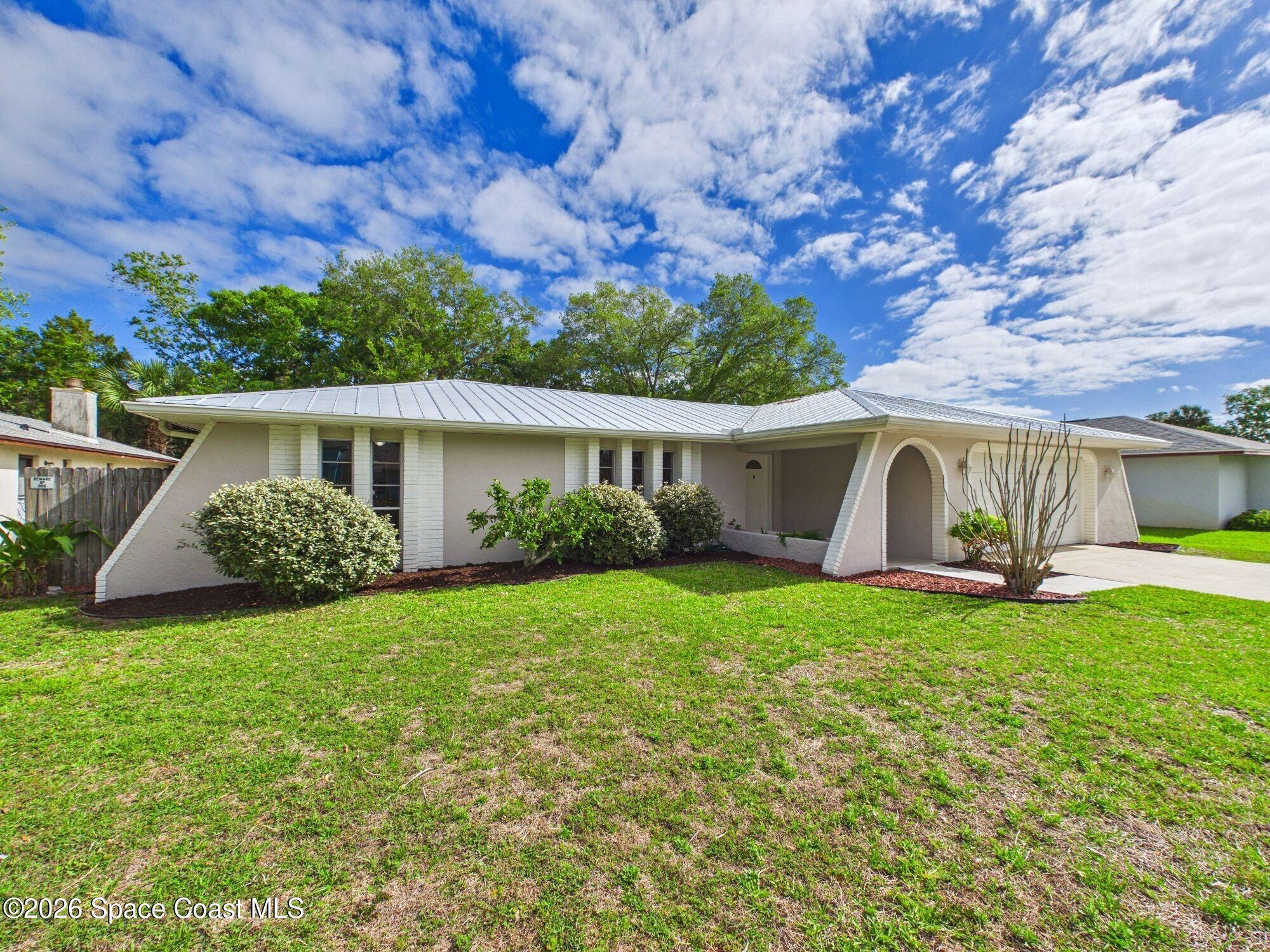 1523 Breese Street Northeast Palm Bay, FL 32905 - Photo 2 of 38 1523-breese-st-palm-bay-02