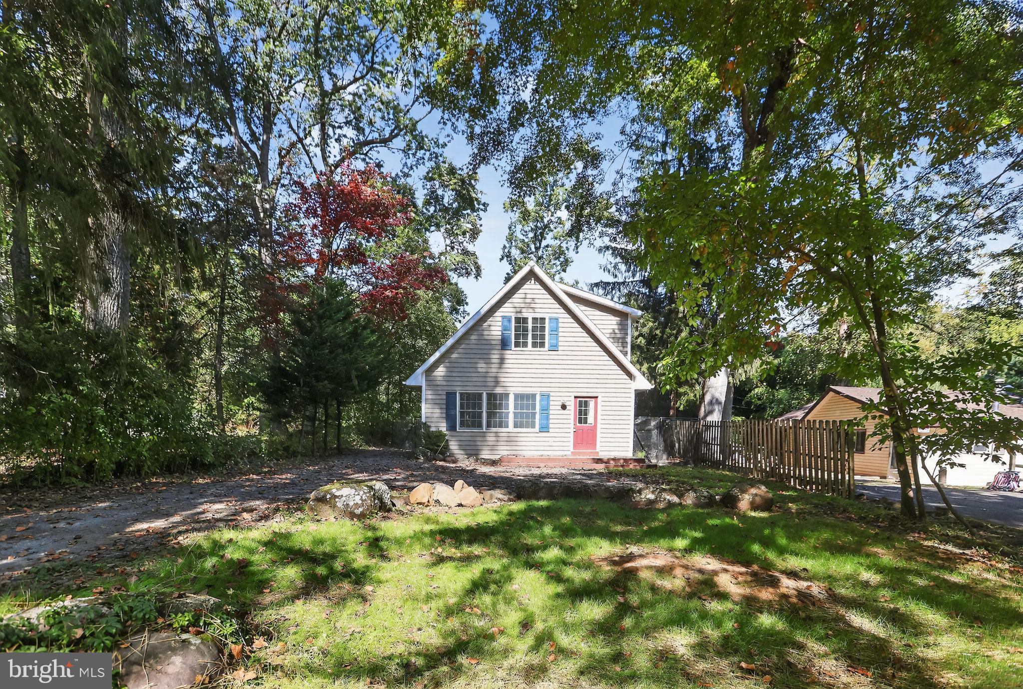 1709 Snyder Road Green Lane, PA 18054 - Photo 2 of 30 a house view with a garden space