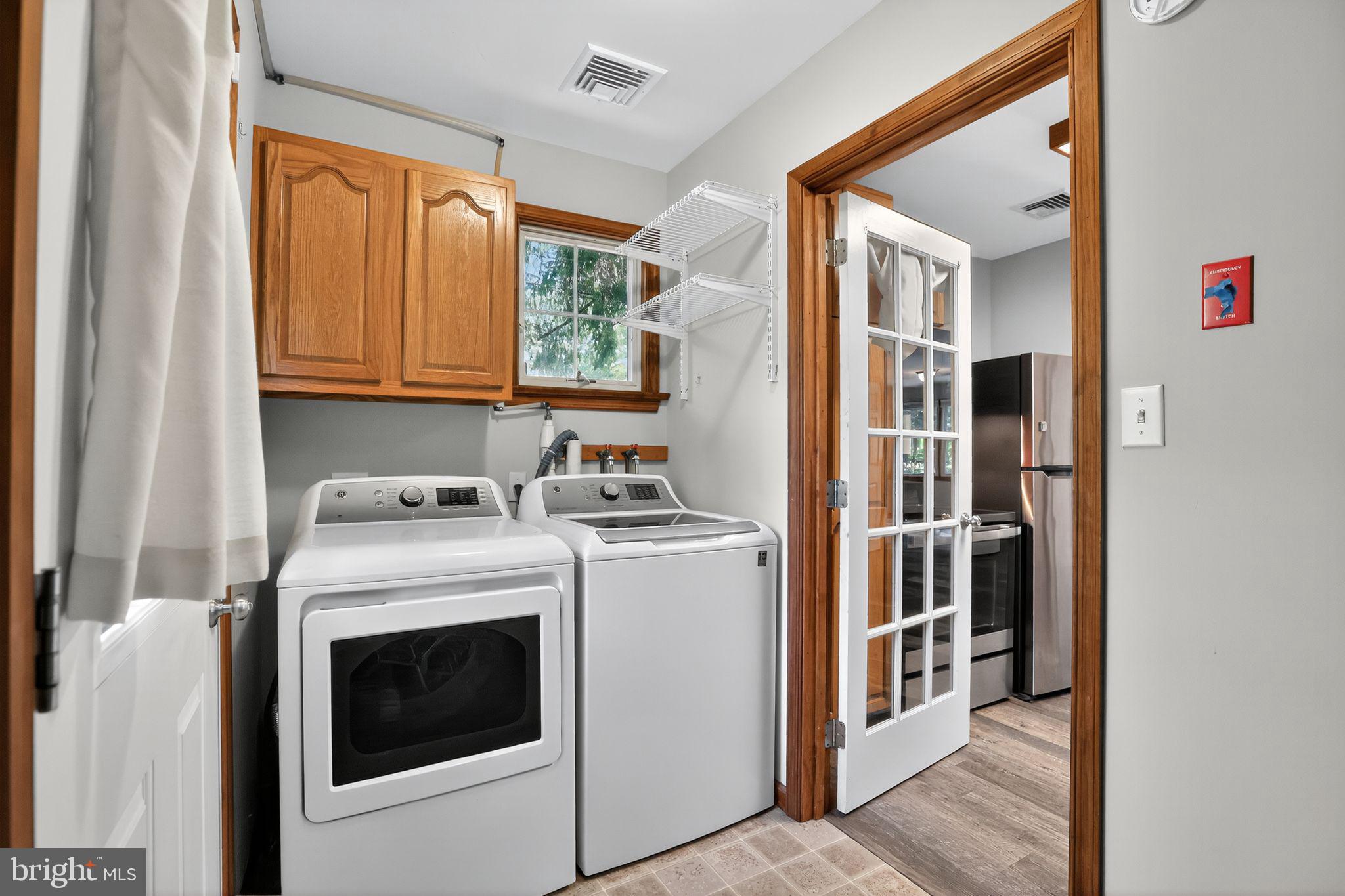 1709 Snyder Road Green Lane, PA 18054 - Photo 25 of 30 a utility room with dryer and washer