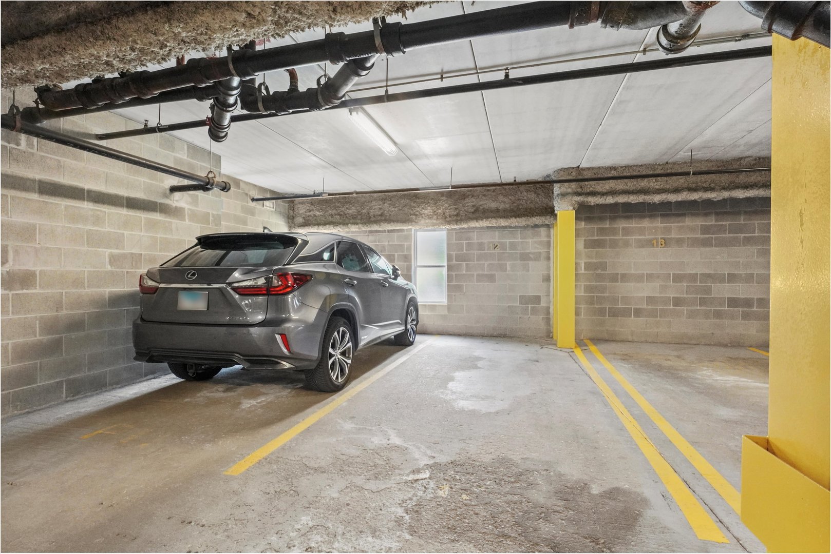 1075 West Roosevelt Road, Unit 206 Chicago, IL 60608 - Photo 15 of 17 a view of a garage
