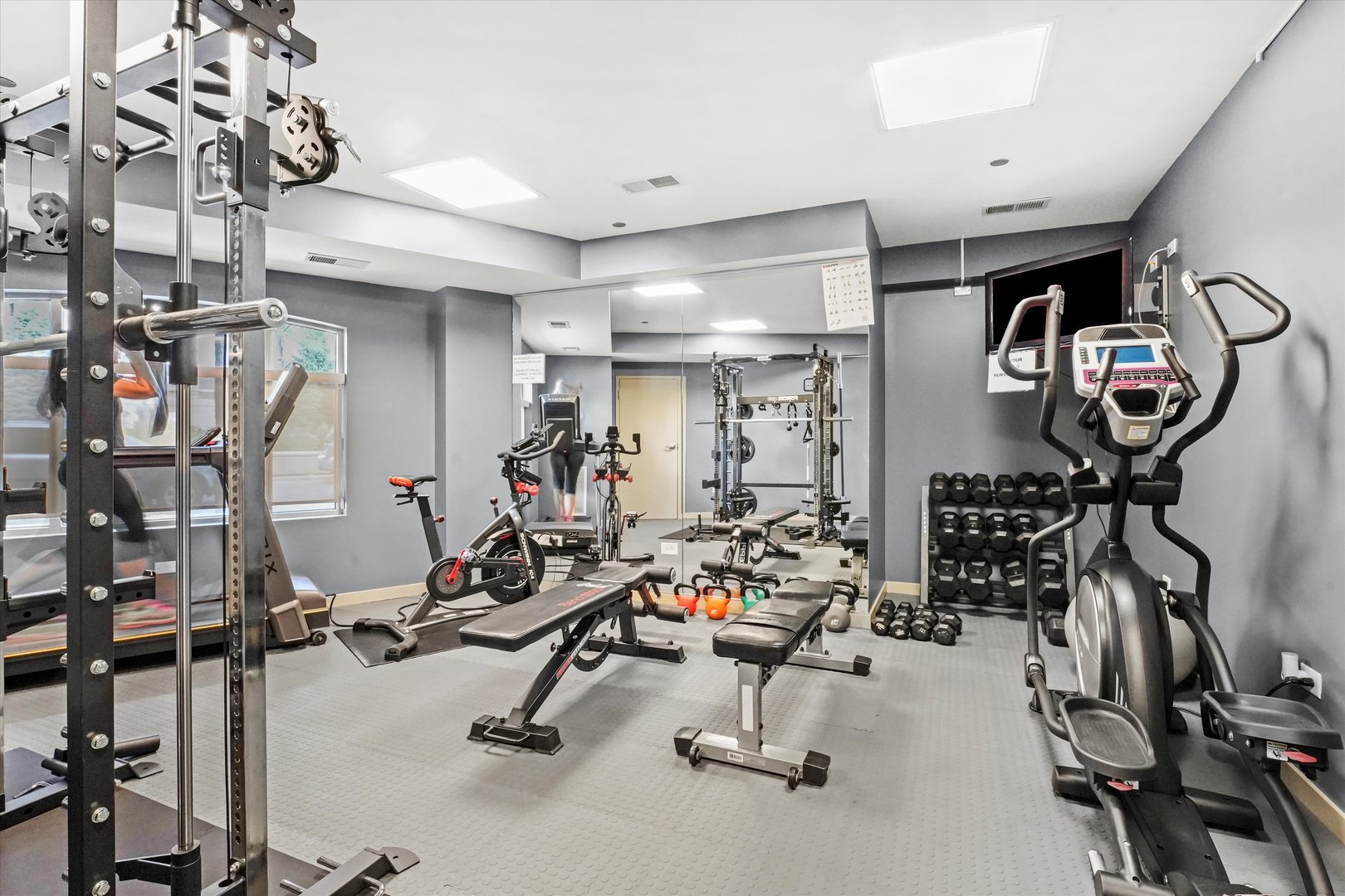 1075 West Roosevelt Road, Unit 206 Chicago, IL 60608 - Photo 16 of 17 a view of a room with gym equipment