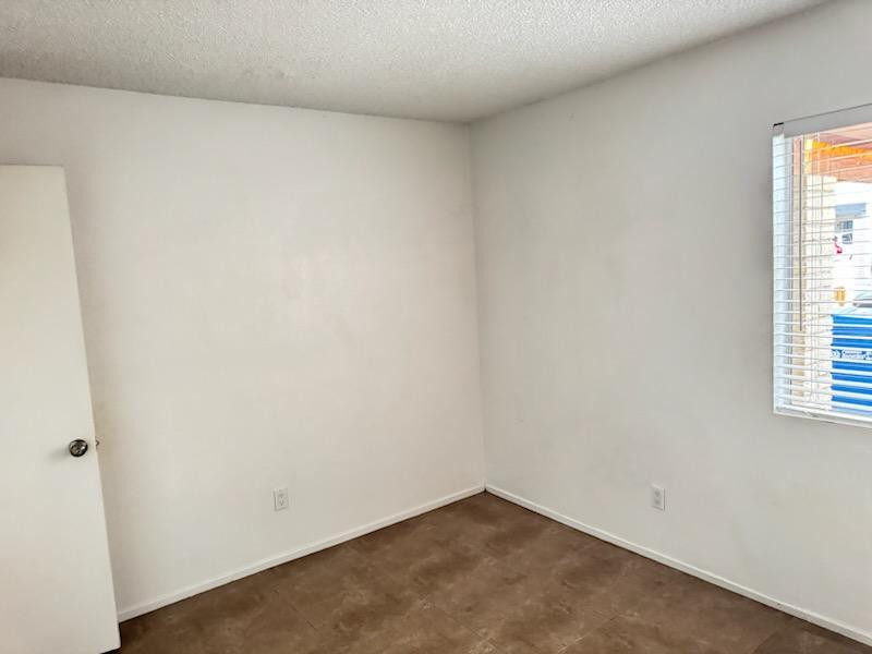 5126 East Monte Vista Road Phoenix, AZ 85008 - Photo 11 of 22 a view of an empty room and a window