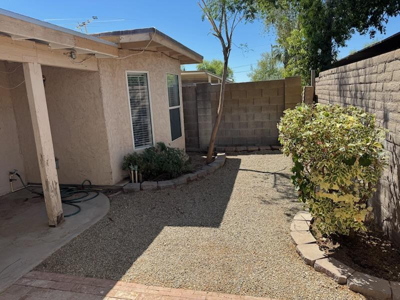 5126 East Monte Vista Road Phoenix, AZ 85008 - Photo 20 of 22 a view of a house with a yard