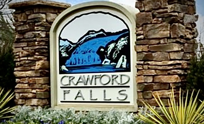 203 Kelly Road, Unit 711 Clemson, SC 29631 - Photo 2 of 2 Welcome to Crawford Falls, a community with a charming entrance featuring natural stone pillars.