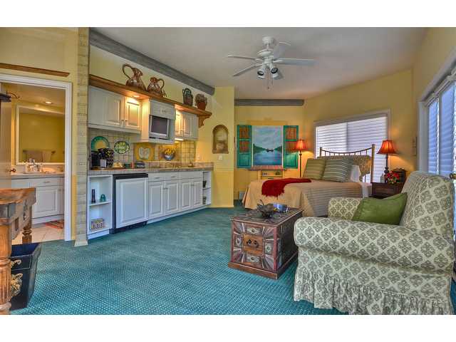 5259 La Glorieta Rancho Santa Fe, CA 92067 - Photo 14 of 25 Detached guest suite with kitchenette. French doors open out to the tennis court which lets this double as a luxurious viewing pavilion.