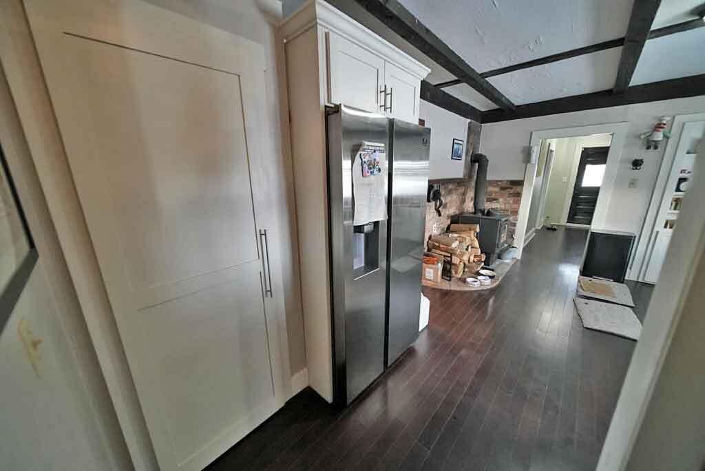 111 Currie Road Smyrna, ME 04780 - Photo 12 of 98 storage-kitchen-woodstove