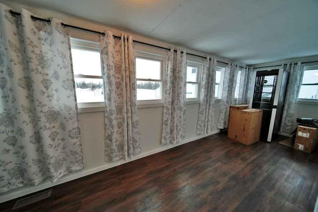 111 Currie Road Smyrna, ME 04780 - Photo 26 of 98 porch-room-south-side