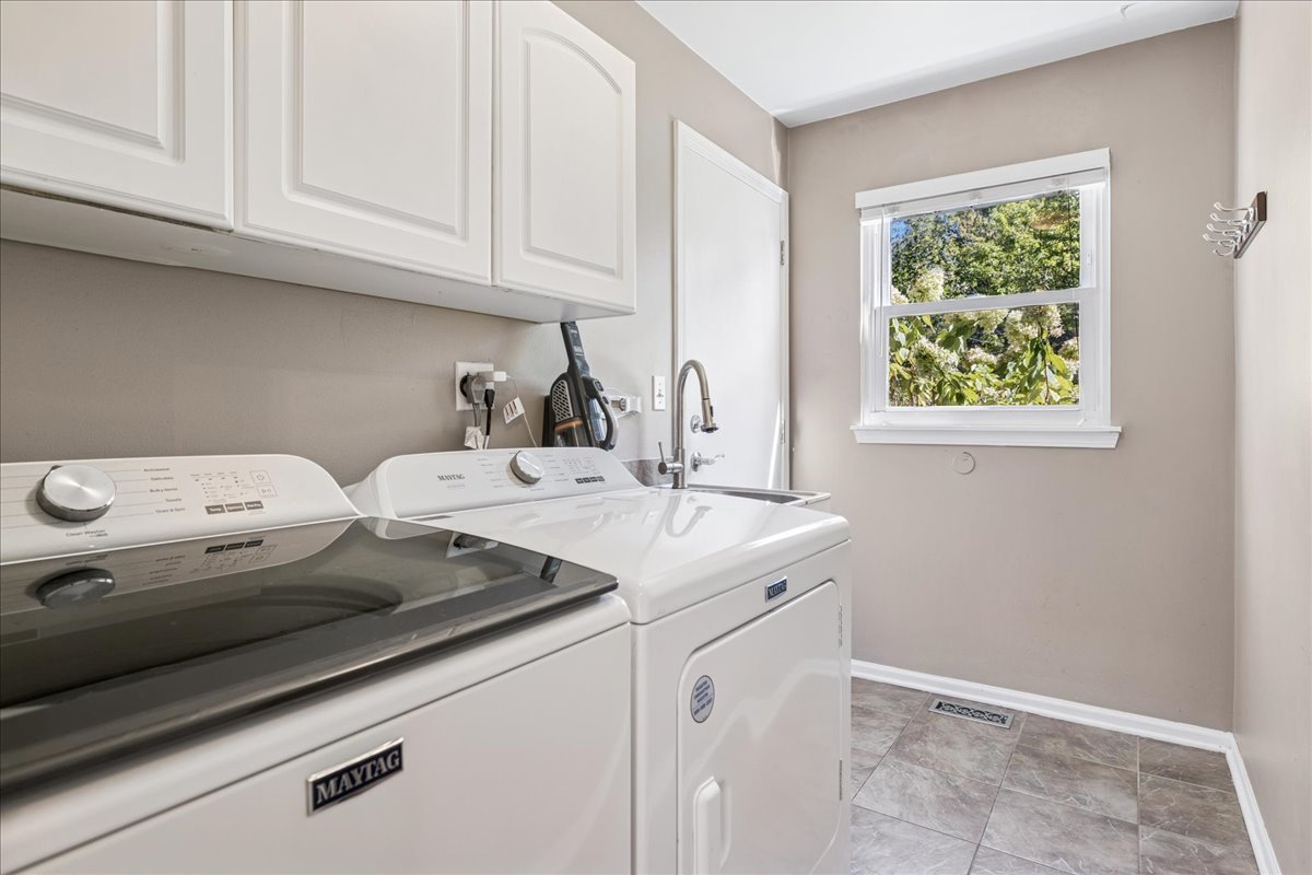2308 Loop Road Algonquin, IL 60102 - Photo 18 of 73 a kitchen with a sink cabinets and a window