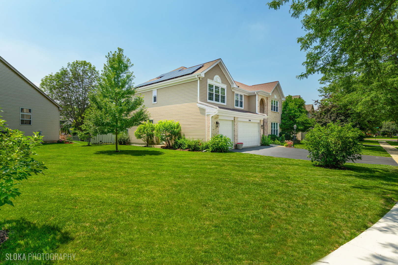 2308 Loop Road Algonquin, IL 60102 - Photo 36 of 73 a house that is sitting in the grass