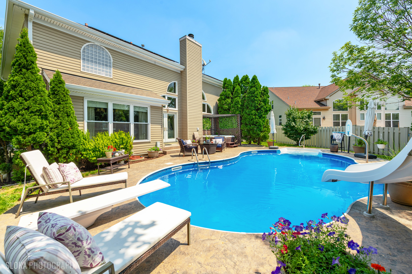 2308 Loop Road Algonquin, IL 60102 - Photo 39 of 73 a view of a swimming pool with a lounge chairs
