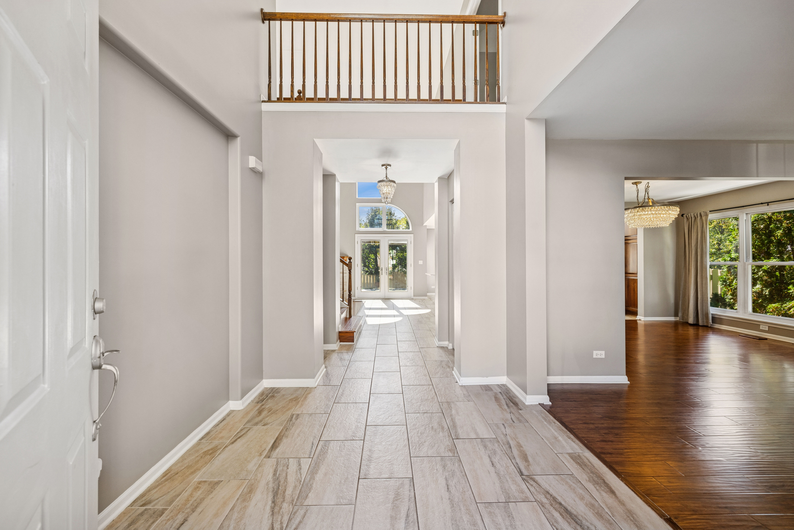 2308 Loop Road Algonquin, IL 60102 - Photo 4 of 73 a view of a hallway view with wooden floor and staircase