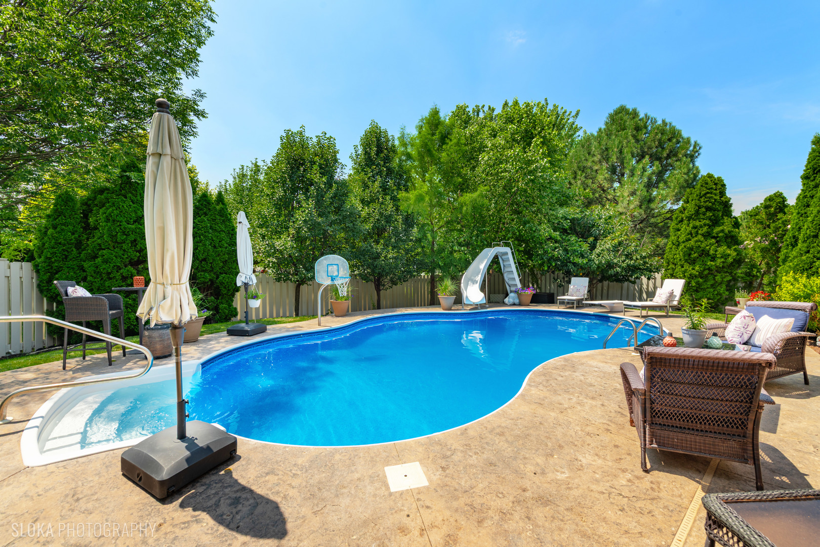 2308 Loop Road Algonquin, IL 60102 - Photo 43 of 73 a view of a swimming pool with a patio and a yard