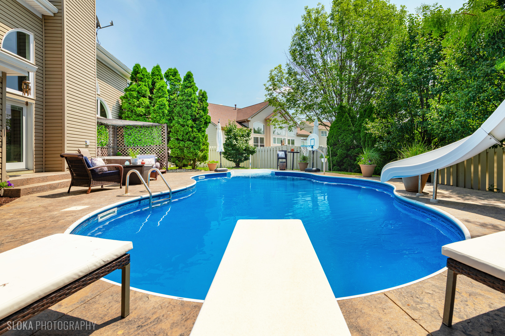 2308 Loop Road Algonquin, IL 60102 - Photo 45 of 73 a view of a swimming pool with lounge chairs