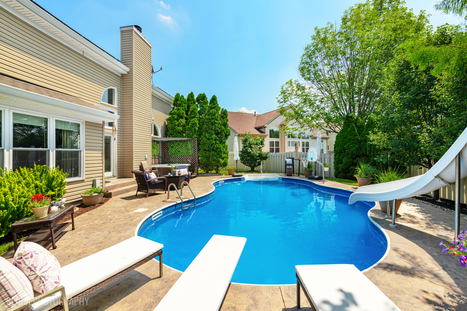 2308 Loop Road Algonquin, IL 60102 - Photo 46 of 73 a view of a patio with chairs and potted plants