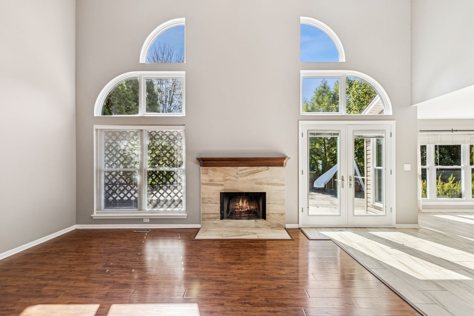 2308 Loop Road Algonquin, IL 60102 - Photo 10 of 73 wooden floor fireplace and windows