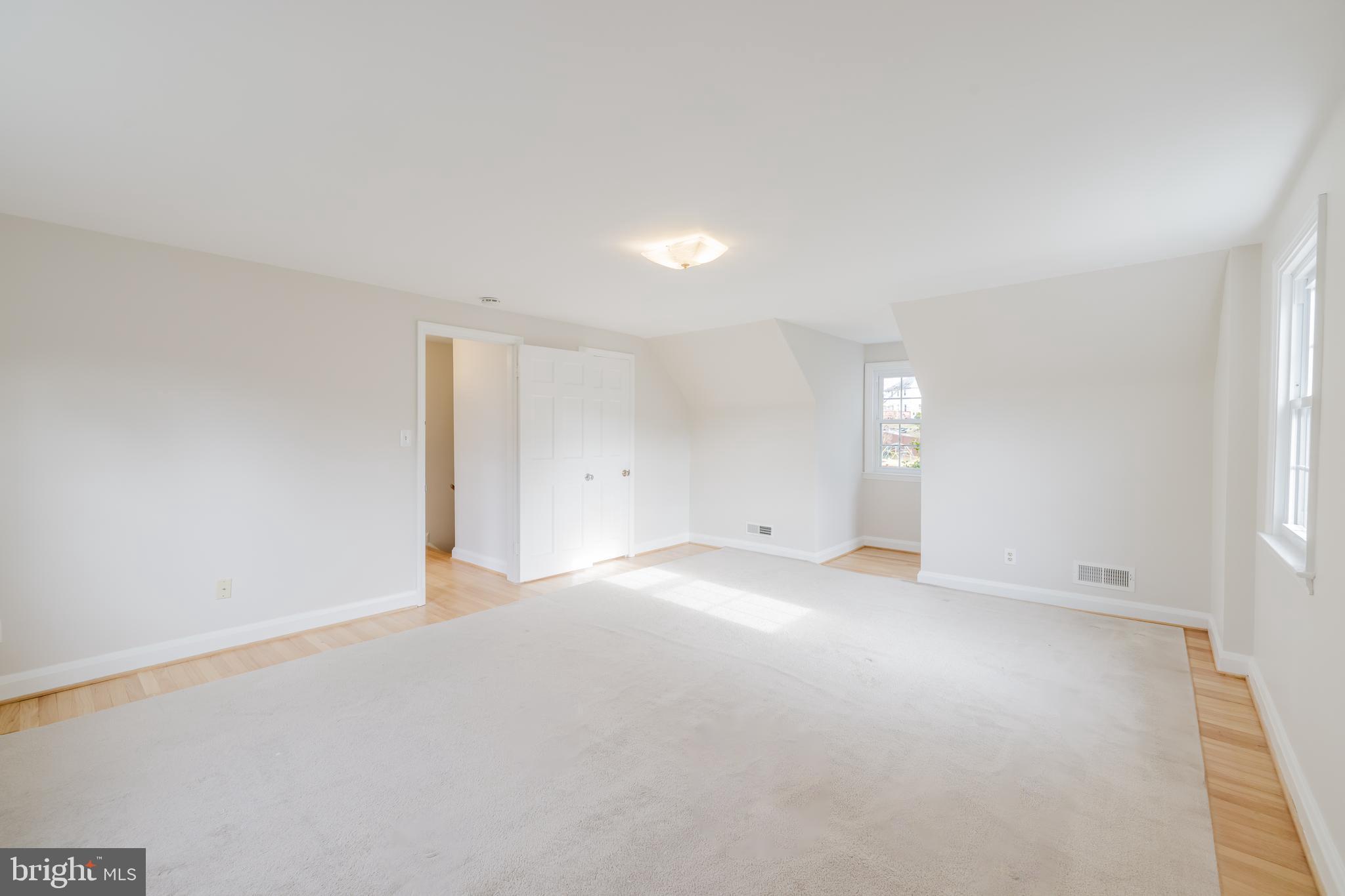 904 Locustvale Road Towson, MD 21204 - Photo 13 of 29 a view of an empty room with a window