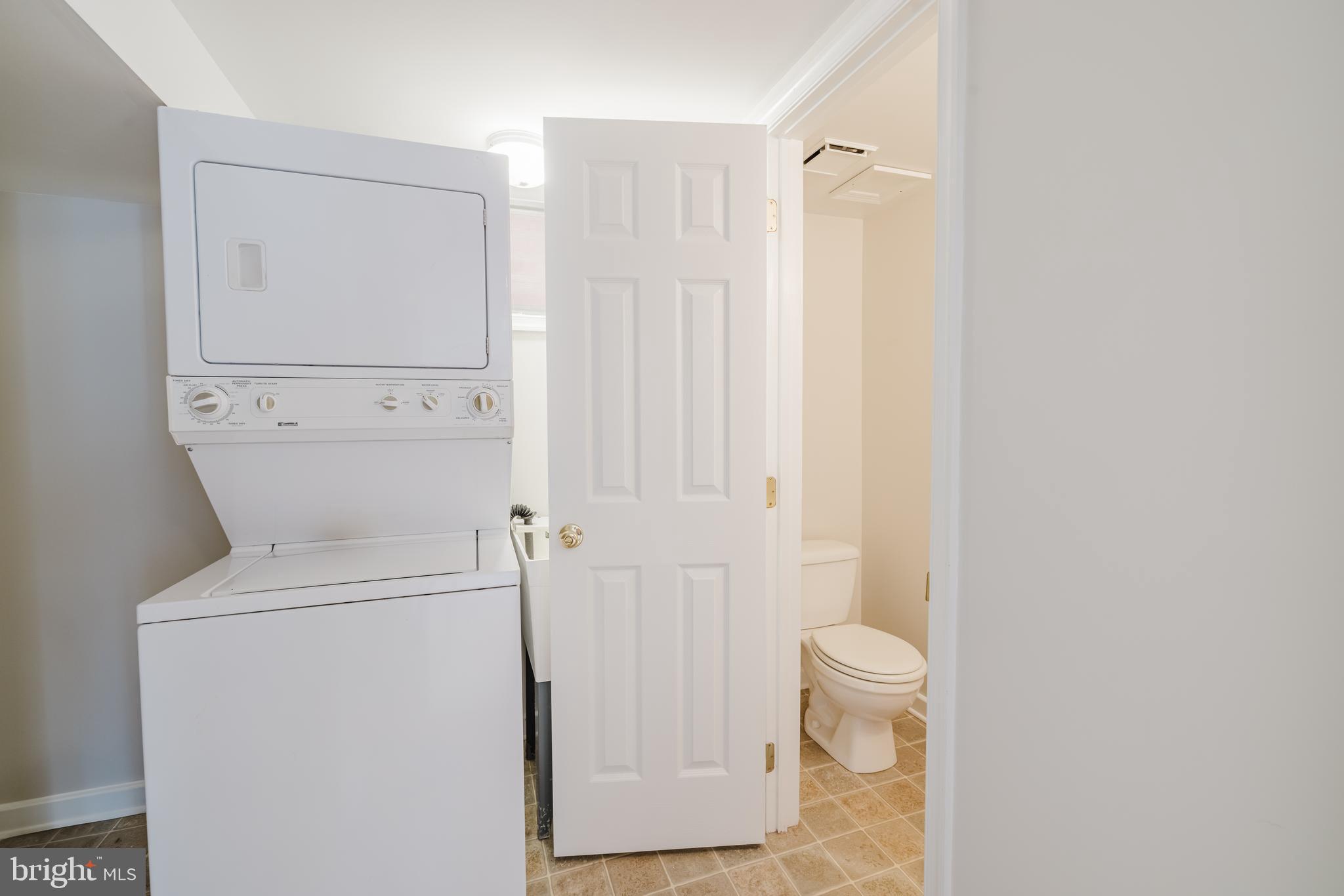 904 Locustvale Road Towson, MD 21204 - Photo 18 of 29 a bathroom with a toilet and a shower