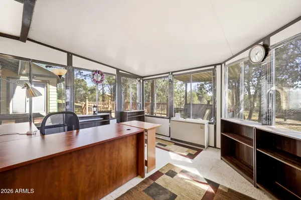 a bedroom with a bed and a walk in closet