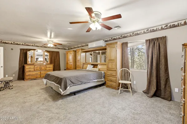 a bathroom with a sink double vanity and a shower