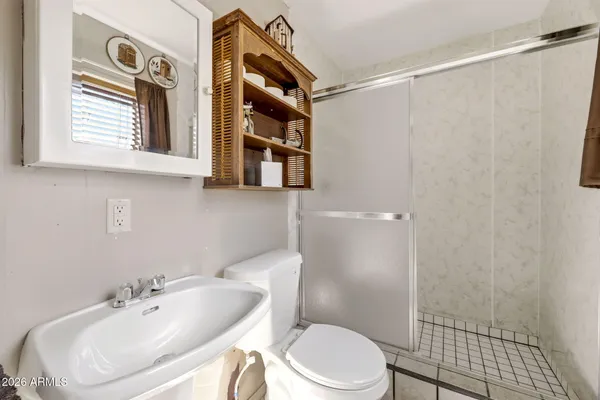 a view of a house with snow on the background