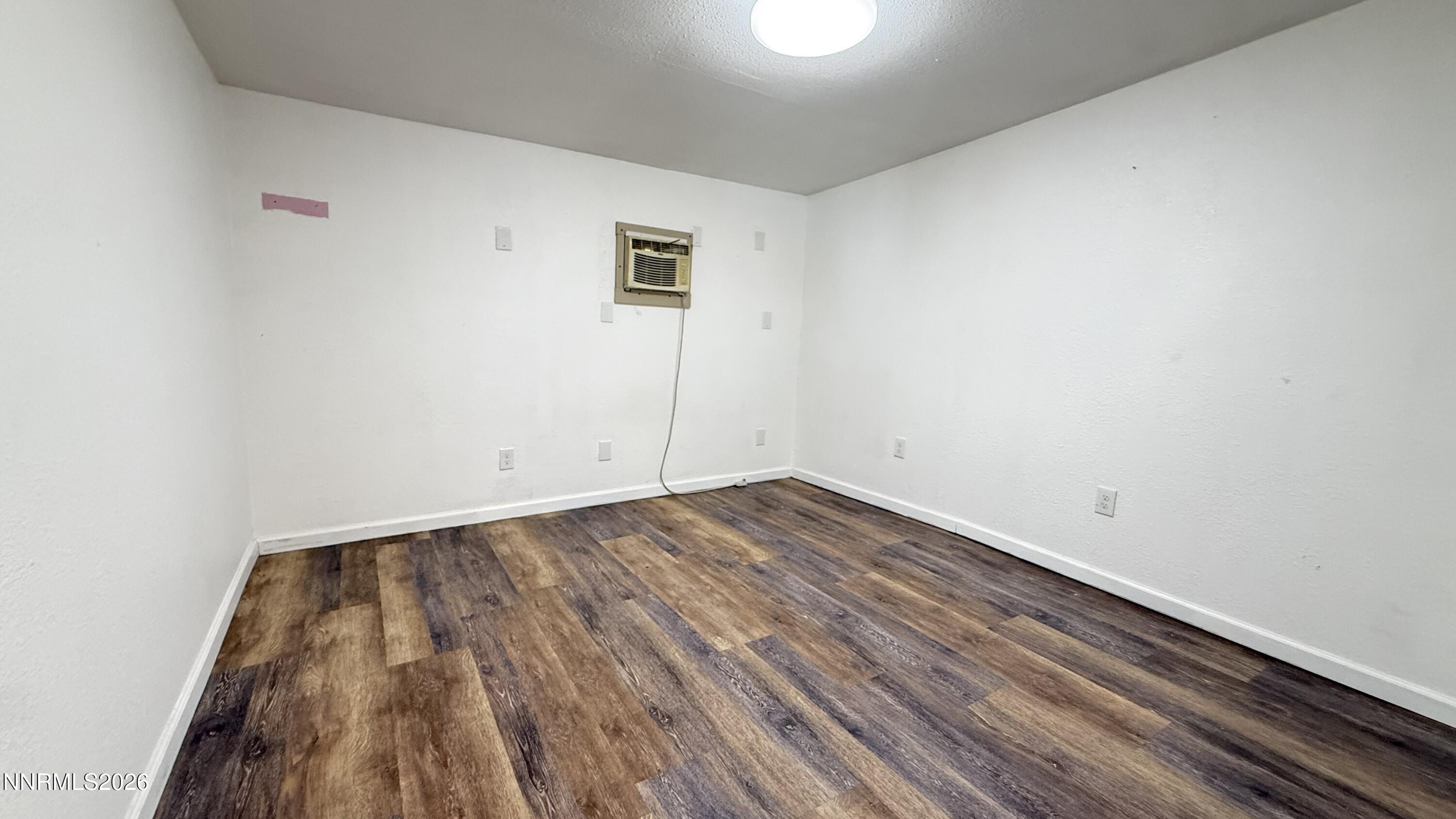 1939 Wilder Street Reno, NV 89512 - Photo 14 of 28 a view of a room with wooden floor