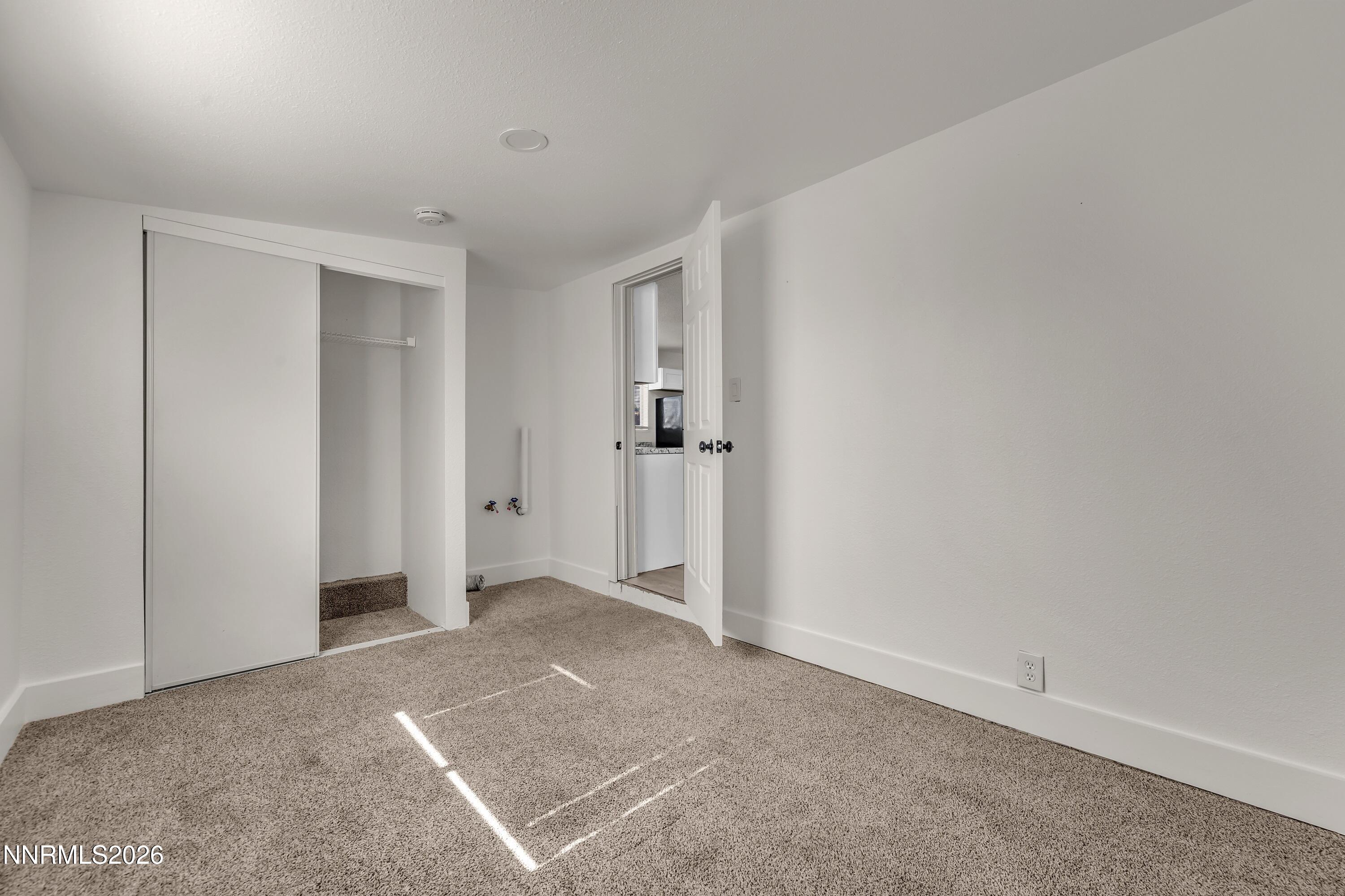 1939 Wilder Street Reno, NV 89512 - Photo 26 of 28 a view of a big room with closet and mirror
