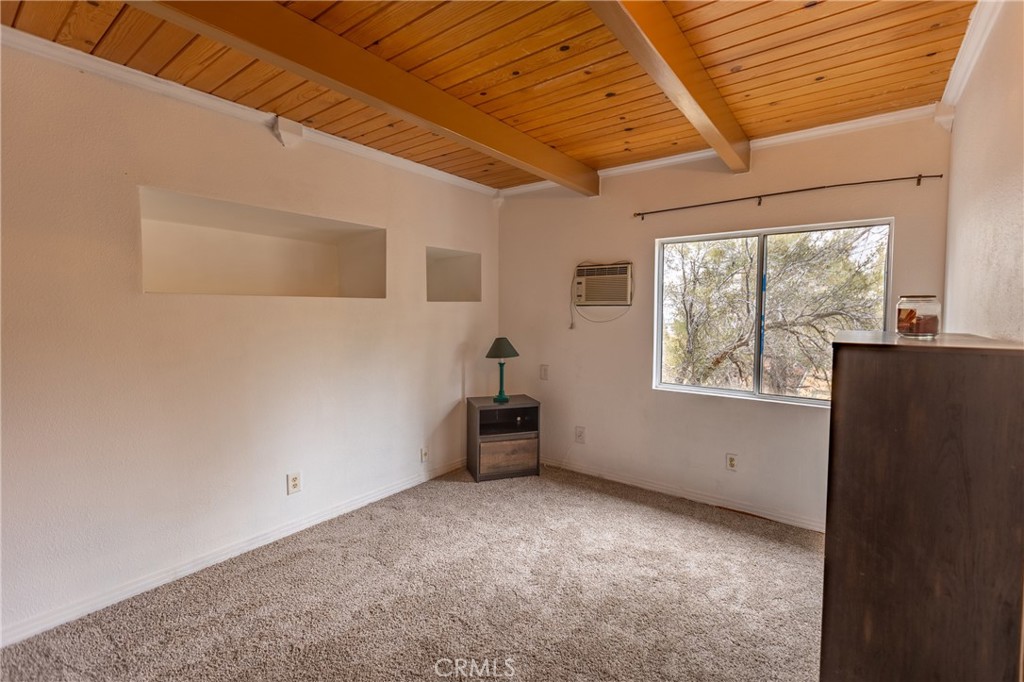 5218 Desert View Drive Wrightwood, CA 92397 - Photo 24 of 50 an empty room with windows