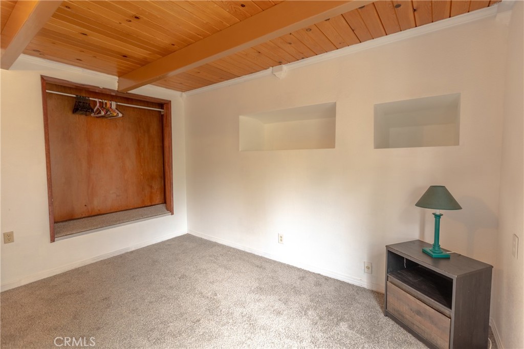 5218 Desert View Drive Wrightwood, CA 92397 - Photo 25 of 50 a view of an empty room with a window