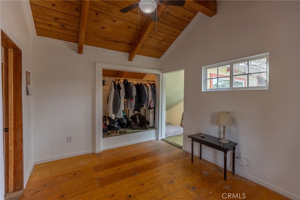 5218 Desert View Drive Wrightwood, CA 92397 - Photo 39 of 50 a bedroom with furniture and a window