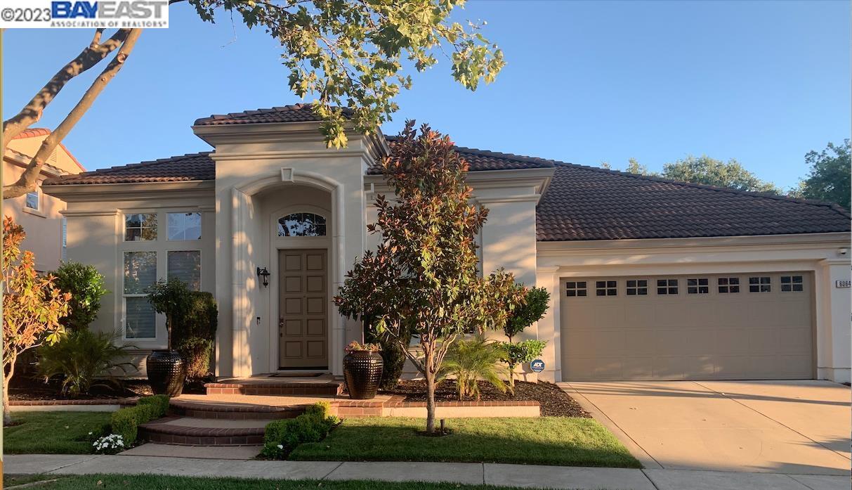 6064 Hedgecrest Circle San Ramon, CA 94582 - Photo 1 of 1 a front view of a house with a yard