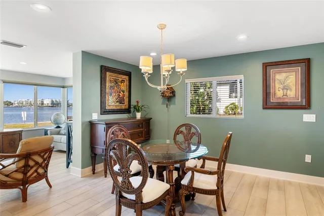 a kitchen with stainless steel appliances granite countertop a stove and a refrigerator