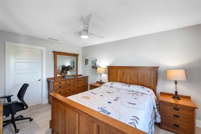 a bathroom with a double sink shower and a mirror