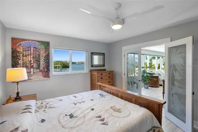 a view of a hallway with furniture and window