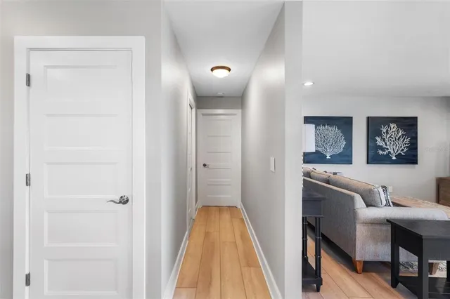 a room with furniture and a wooden floor