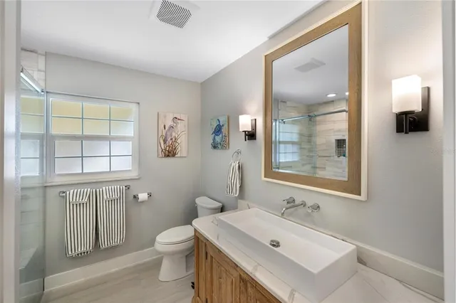 a sign board with lake view