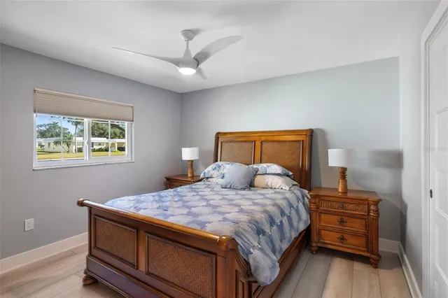 a view of a swimming pool with furniture