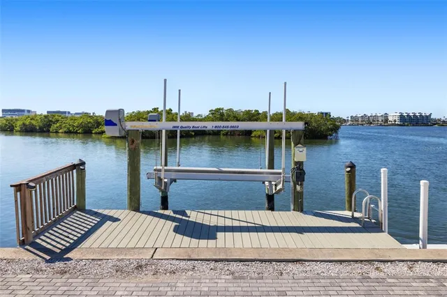 aerial view of a house with a lake view