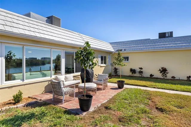 a view of outdoor space with swimming pool and lake view