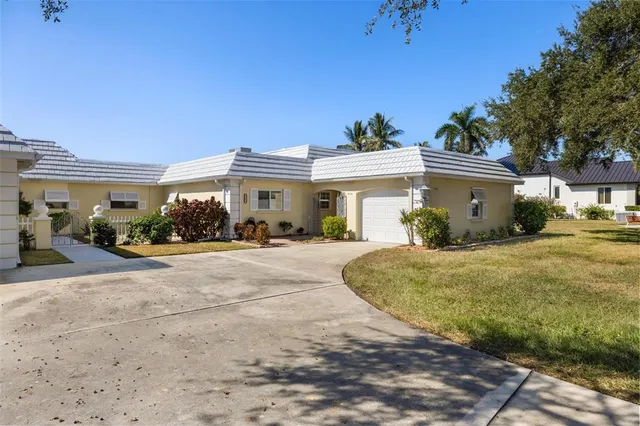 an aerial view of a house with outdoor space