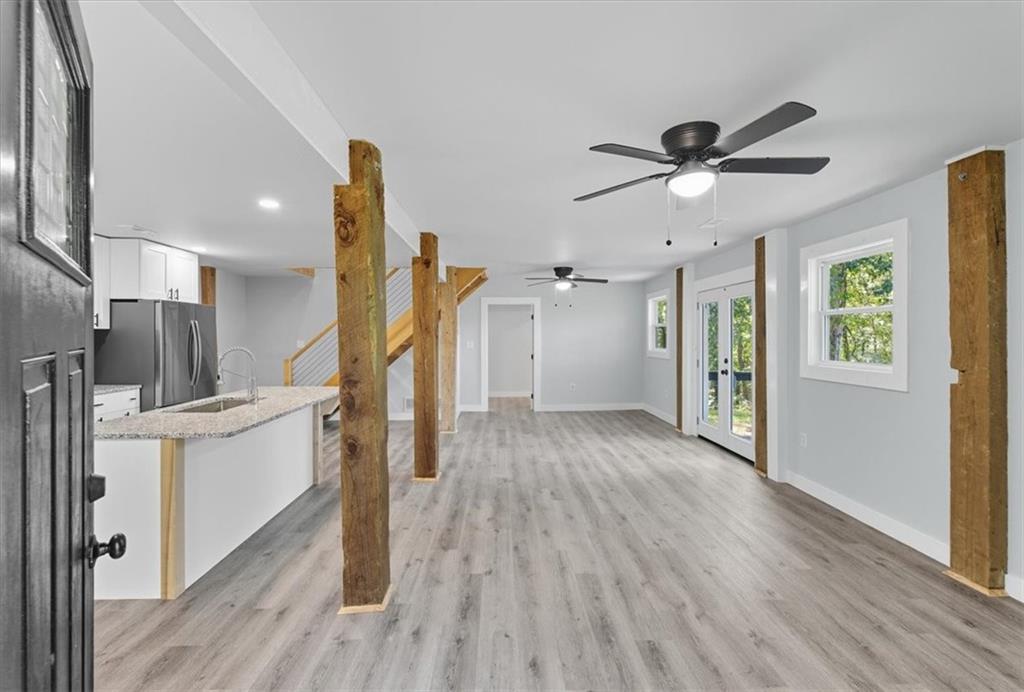 96 Collins Road Rome, GA 30161 - Photo 11 of 57 a view of entryway and hall with wooden floor
