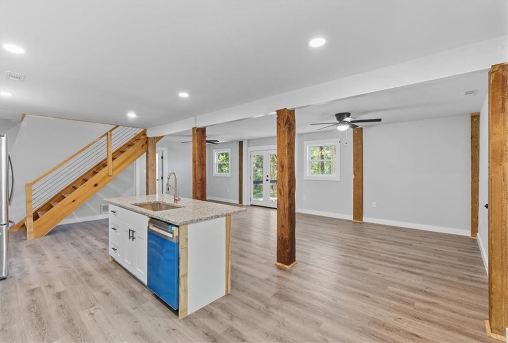 96 Collins Road Rome, GA 30161 - Photo 20 of 57 a view of a hallway with wooden floor and staircase