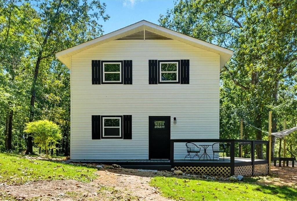 96 Collins Road Rome, GA 30161 - Photo 3 of 57 a view of front of house with a yard