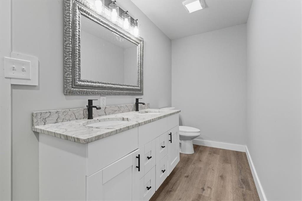 96 Collins Road Rome, GA 30161 - Photo 35 of 57 a bathroom with a sink and a mirror
