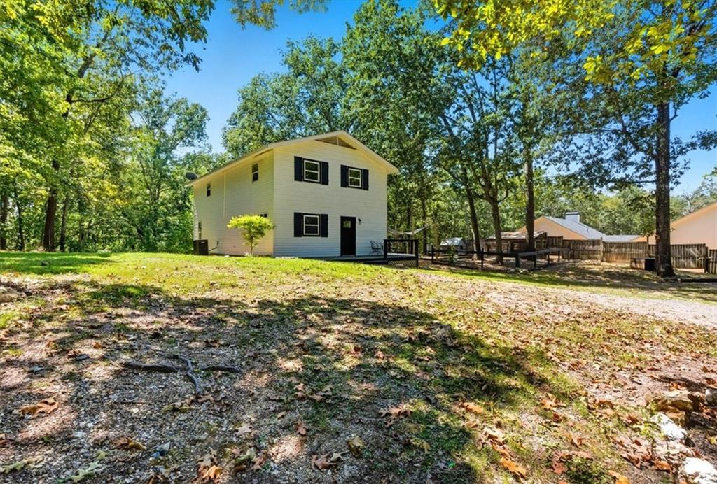 96 Collins Road Rome, GA 30161 - Photo 8 of 57 a front view of a house with a yard