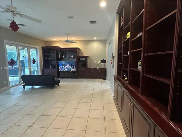 a view of a living room with furniture