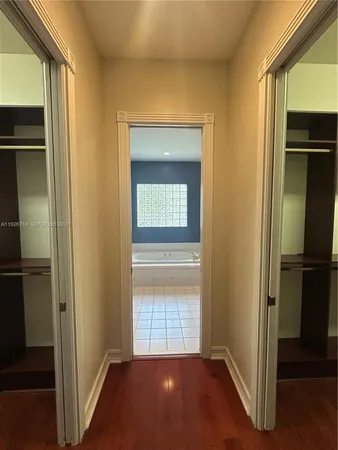 a view of an empty room with a fireplace