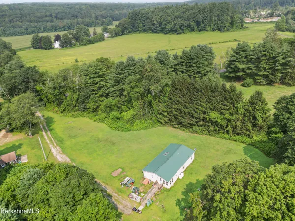 a view of a lake with a yard