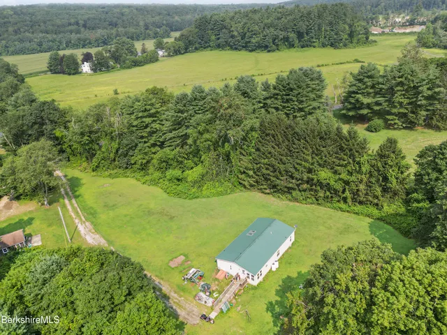 a view of a lake with a yard