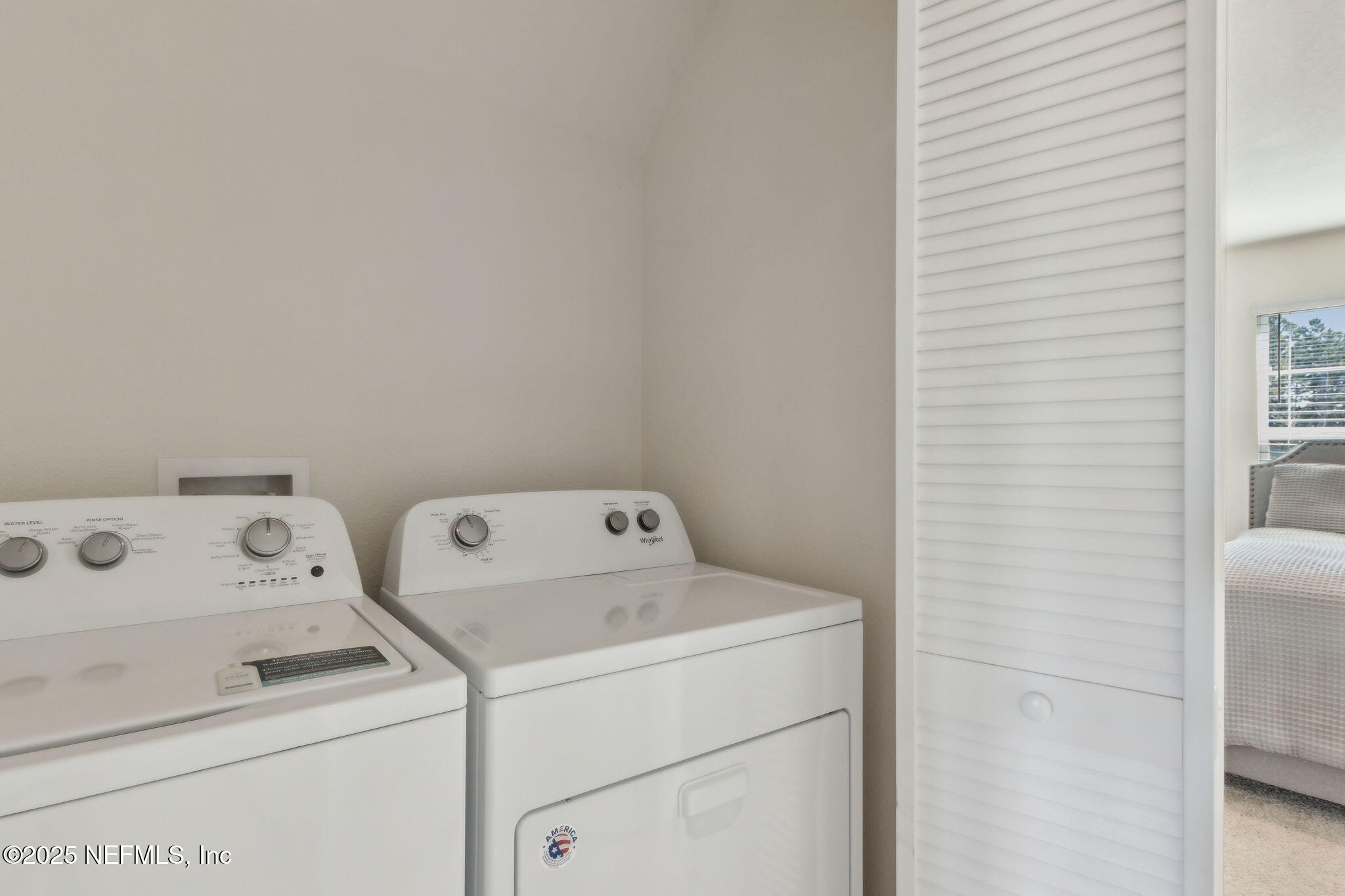 86440 Mainline Road Yulee, FL 32097 - Photo 20 of 36 a view of storage and utility room with washer and dryer